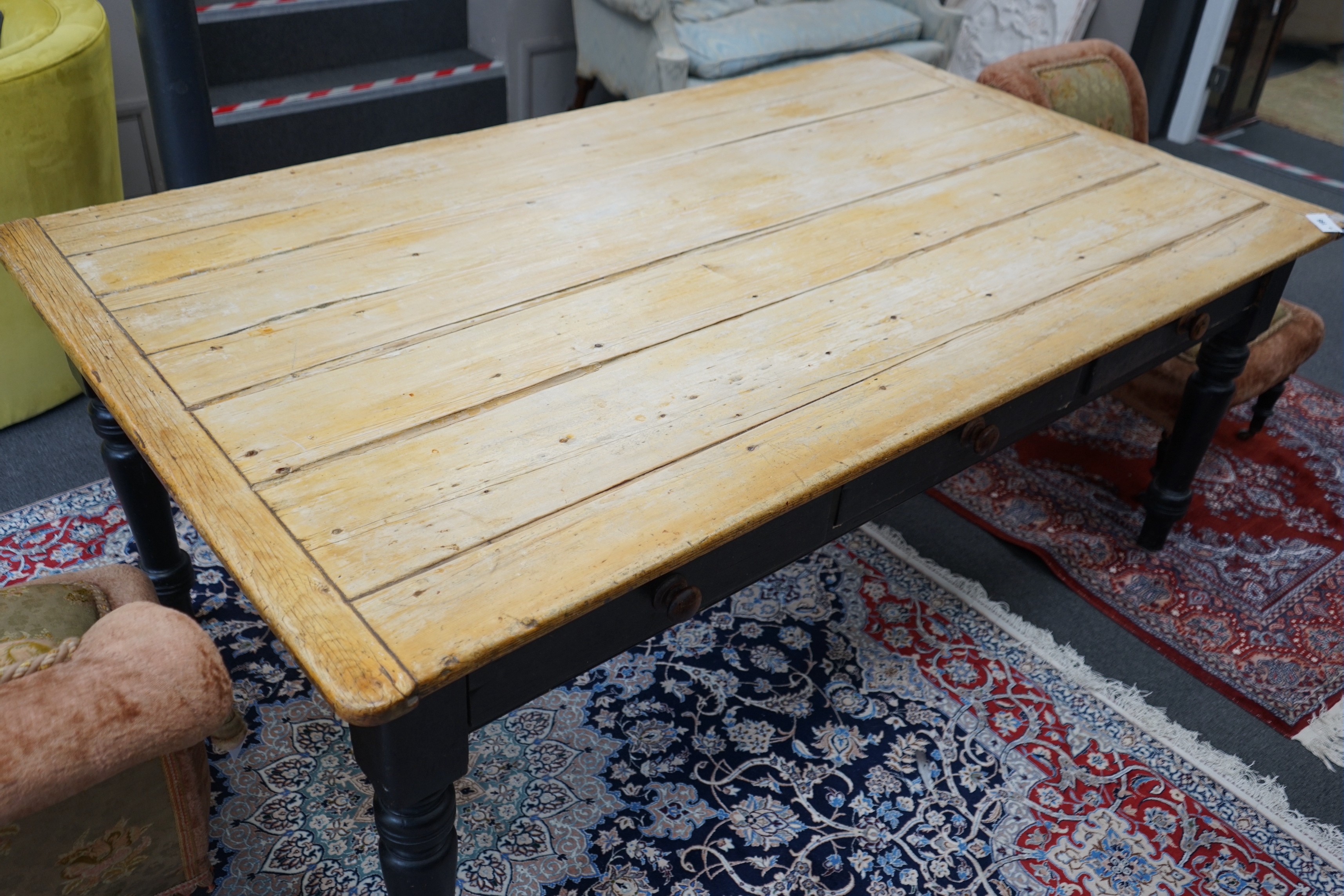 A Victorian rectangular part painted pine three drawer kitchen table, with scrubbed planked top, length 195cm, depth 112cm, height 79cm